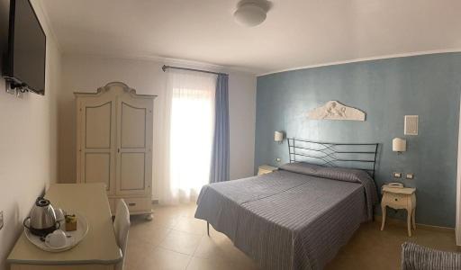 Cama ou camas em um quarto em Hotel Boutique Il Castellino Relais