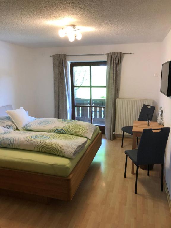 Postel nebo postele na pokoji v ubytování Kailgut