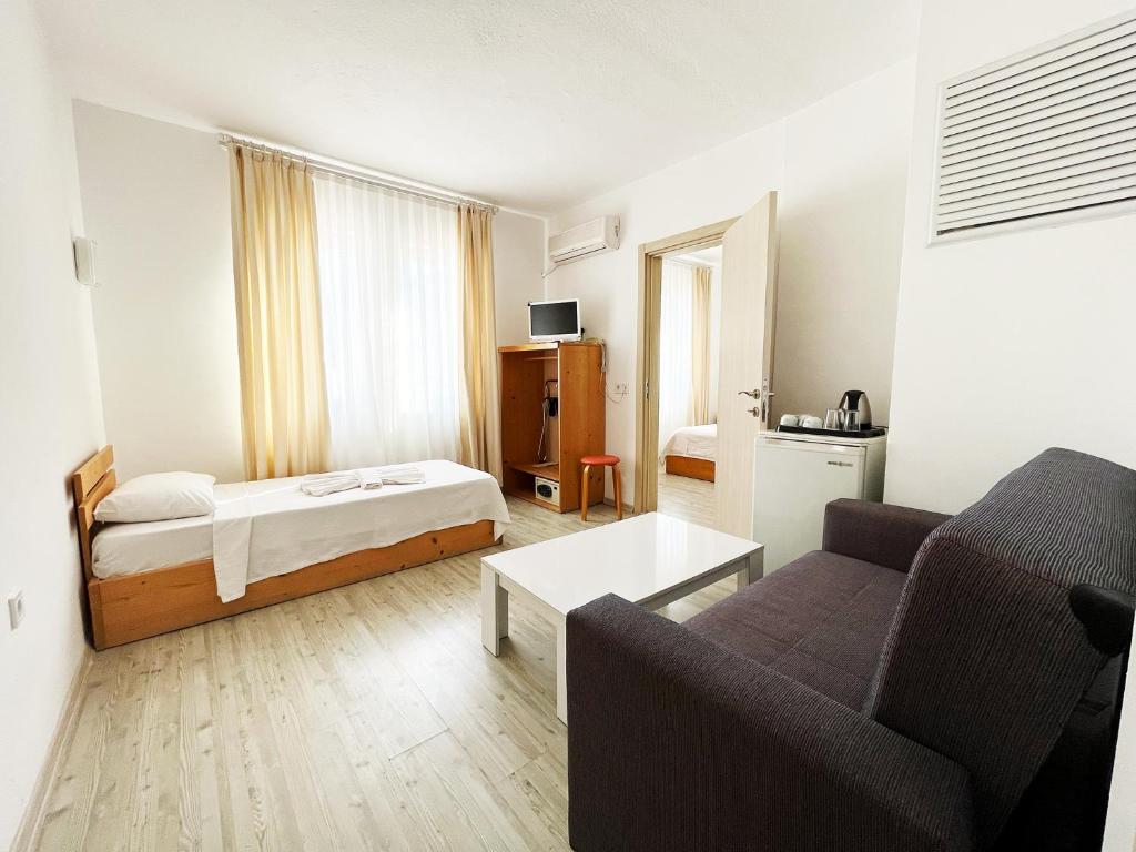 Postel nebo postele na pokoji v ubytování Zephyros City Otel