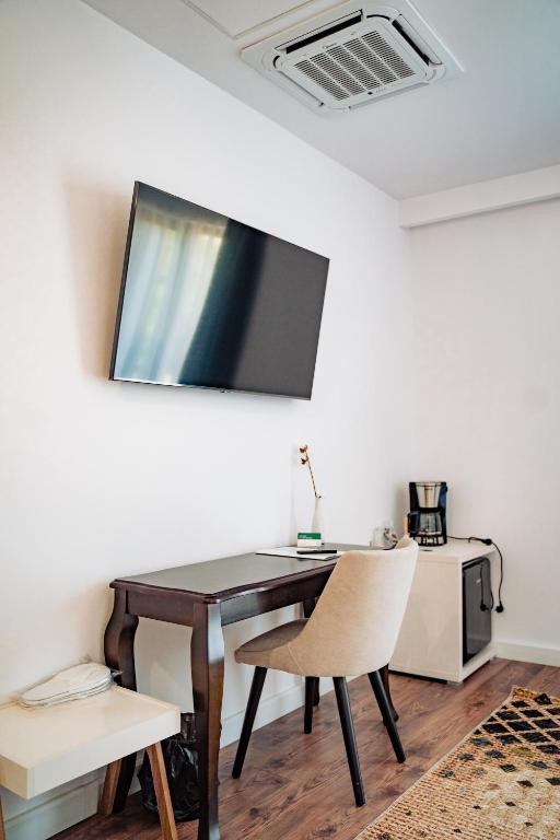 TV a/nebo společenská místnost v ubytování Hotel B4