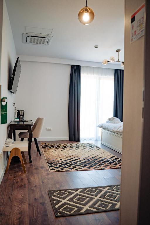 Postel nebo postele na pokoji v ubytování Hotel B4