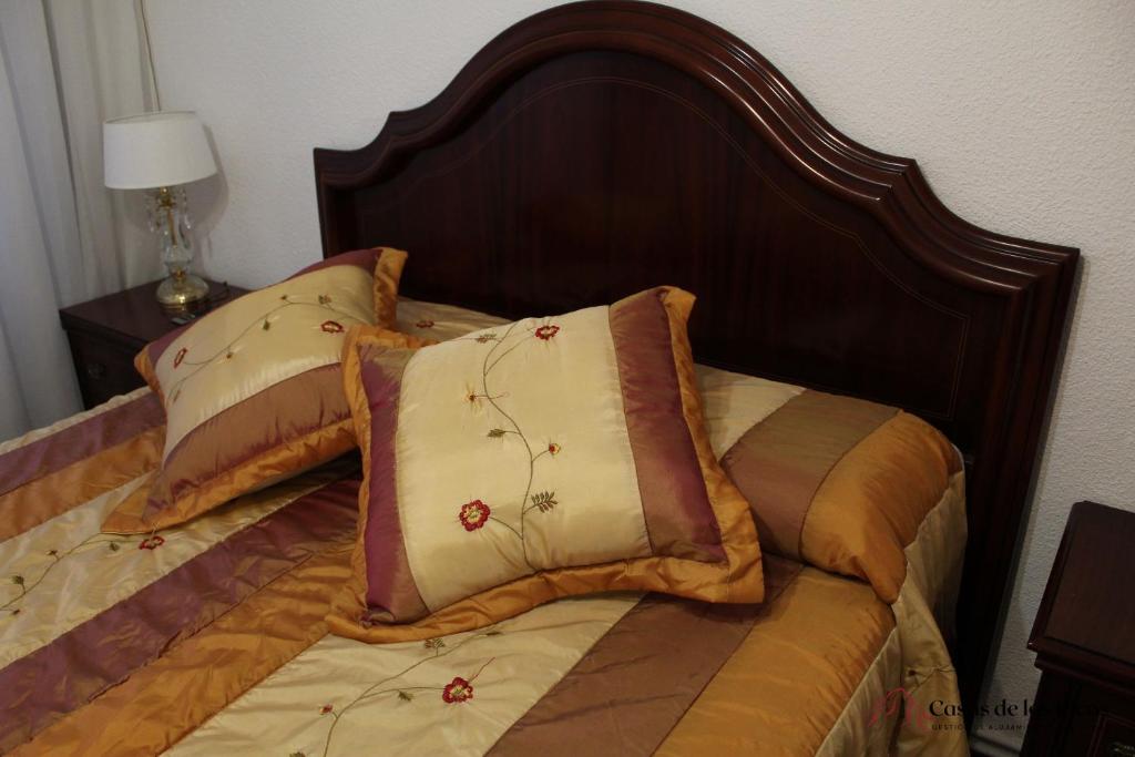 Postel nebo postele na pokoji v ubytování VUT La Fuentina -Casas de los Picos
