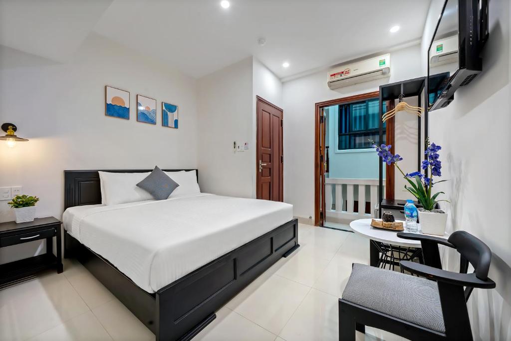 Postel nebo postele na pokoji v ubytování 1 Stop Dory Hotel