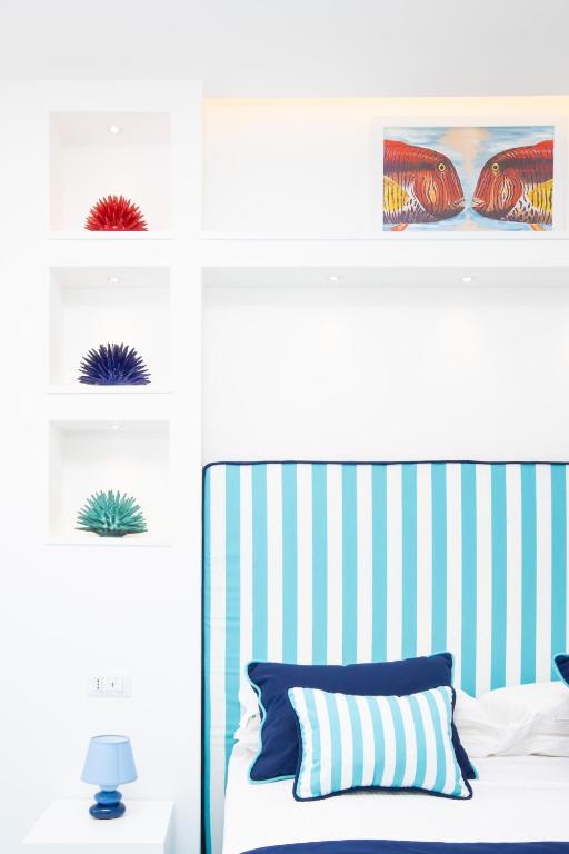 Posteľ alebo postele v izbe v ubytovaní YourHome - Blu Oltre