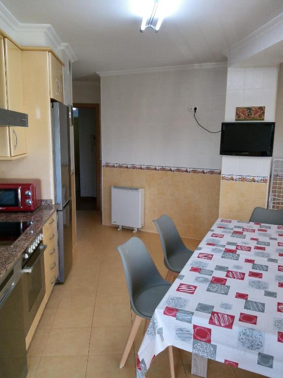 A kitchen or kitchenette at boiro playa barraña
