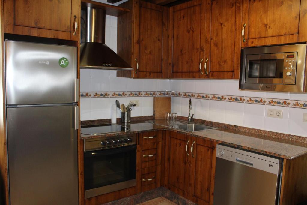 Kuchyň nebo kuchyňský kout v ubytování Vivienda vacacional La Güera - Casas de los Picos