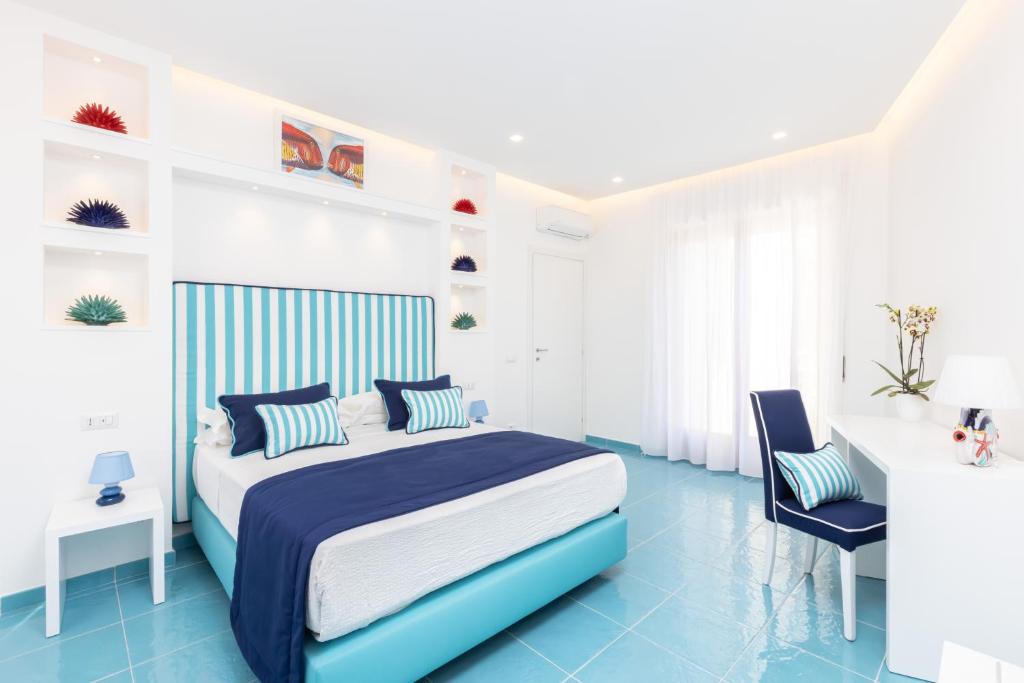 Posteľ alebo postele v izbe v ubytovaní YourHome - Blu Oltre