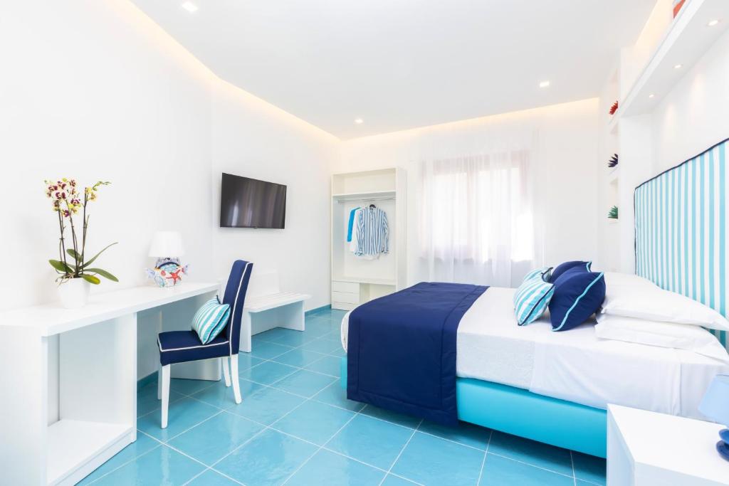 Posteľ alebo postele v izbe v ubytovaní YourHome - Blu Oltre