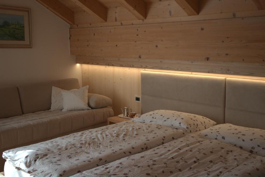Postel nebo postele na pokoji v ubytování B&B Casa Riz