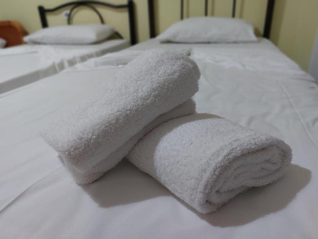 A bed or beds in a room at VILLA ELENA