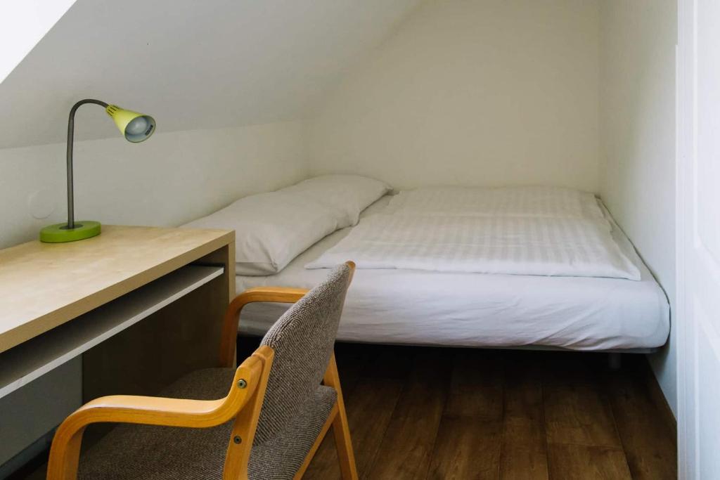 Łóżko lub łóżka w pokoju w obiekcie Diófa Apartman