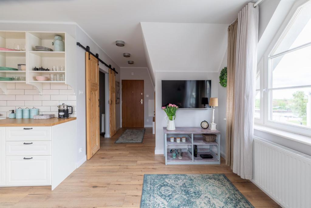 Kuchyňa alebo kuchynka v ubytovaní Apartament Bulvar Starówka