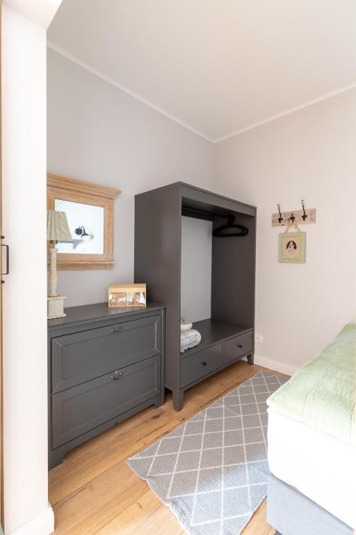 Posteľ alebo postele v izbe v ubytovaní Apartament Bulvar Starówka