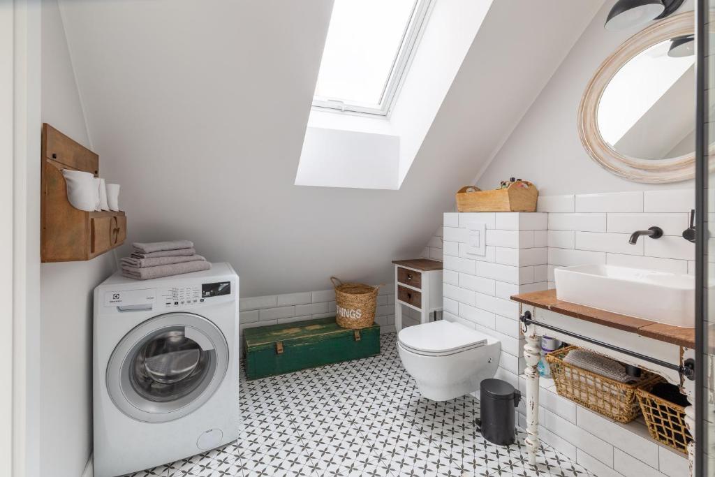 Kúpeľňa v ubytovaní Apartament Bulvar Starówka