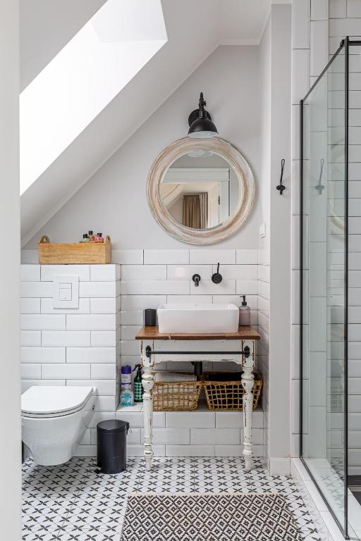 Kúpeľňa v ubytovaní Apartament Bulvar Starówka