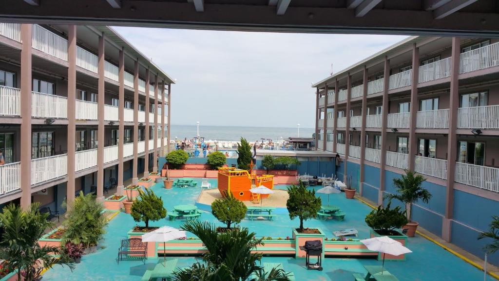 a view of a building with a swimming pool at Flagship Oceanfront in Ocean City