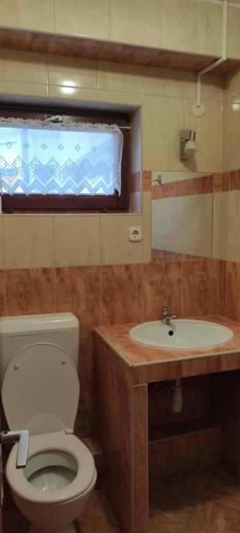Łazienka w obiekcie Apartmanház Gabriella