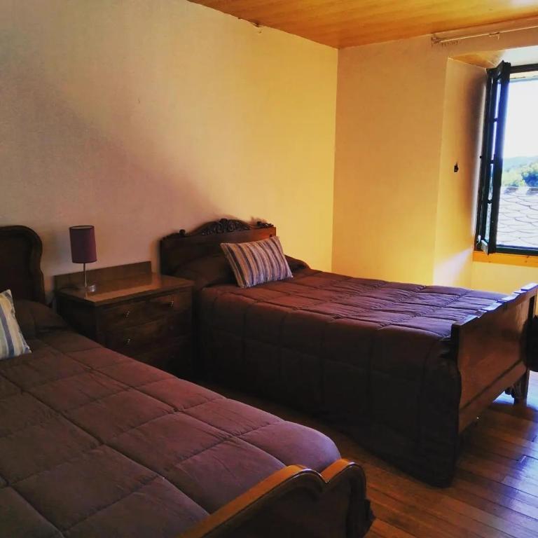 Posteľ alebo postele v izbe v ubytovaní Casa Fidel.