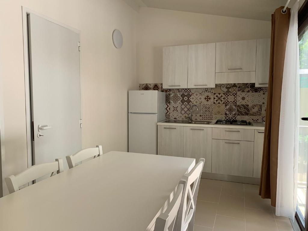 Kuchyň nebo kuchyňský kout v ubytování Camping Village Viareggio
