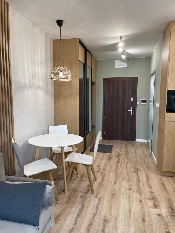 Posedenie v ubytovaní Ukiel Park Green Apartament
