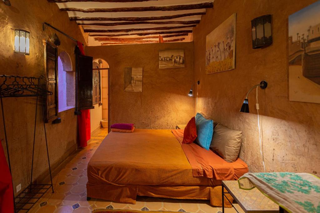 Postel nebo postele na pokoji v ubytování Riad N10