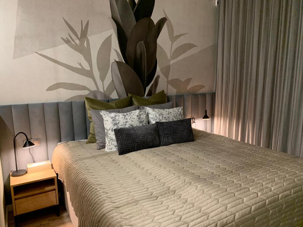 Posteľ alebo postele v izbe v ubytovaní Ukiel Park Green Apartament
