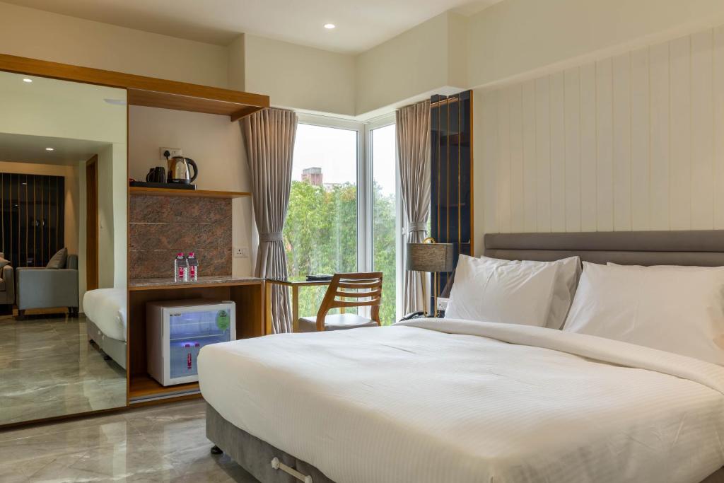 Postel nebo postele na pokoji v ubytování Hotel Nalanda