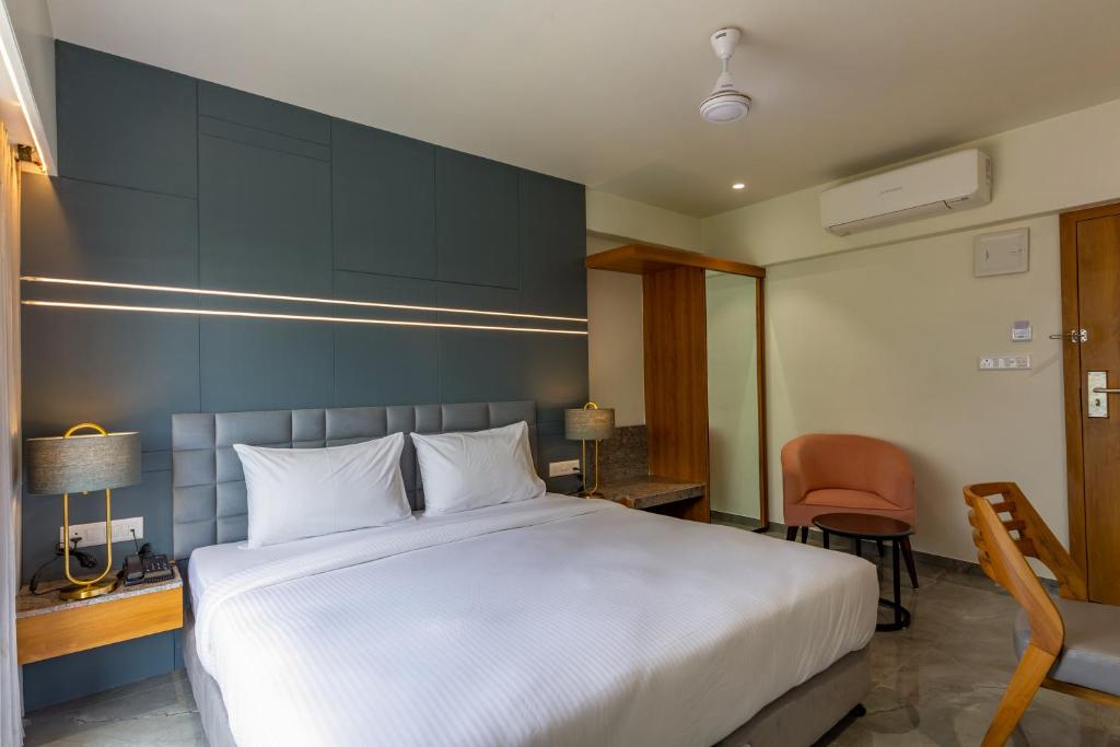 Postel nebo postele na pokoji v ubytování Hotel Nalanda