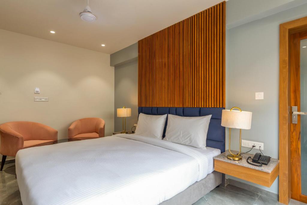 Postel nebo postele na pokoji v ubytování Hotel Nalanda