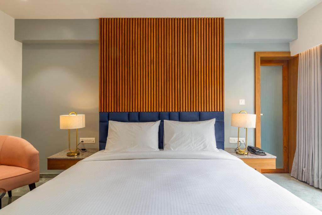 Postel nebo postele na pokoji v ubytování Hotel Nalanda