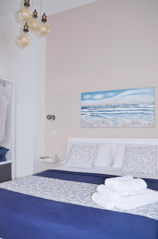 Postel nebo postele na pokoji v ubytování Luna Chiara Home