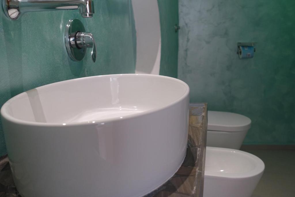 Koupelna v ubytování Il Capriccio Guesthouse