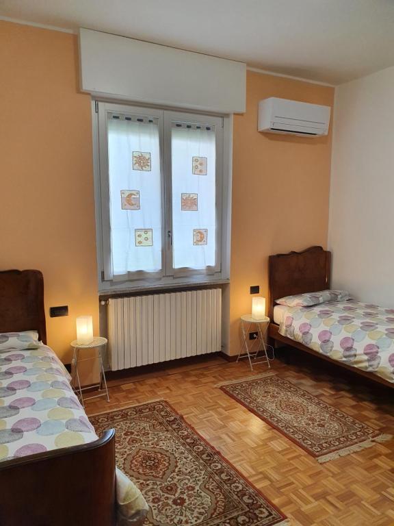 Postel nebo postele na pokoji v ubytování B&B LORI