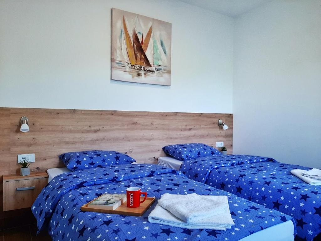 Postel nebo postele na pokoji v ubytování Pool and Villa Splav Dunavac