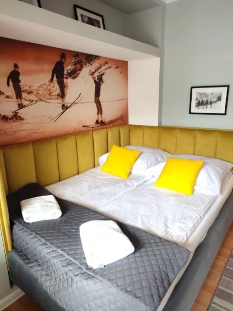 Posteľ alebo postele v izbe v ubytovaní Apartament Biały Miś Centrum