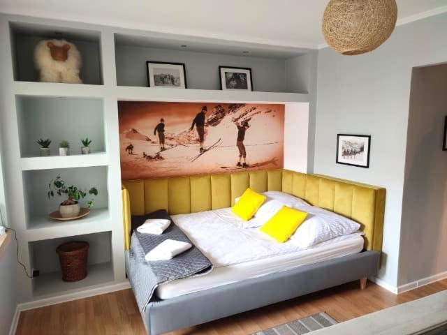 Posteľ alebo postele v izbe v ubytovaní Apartament Biały Miś Centrum