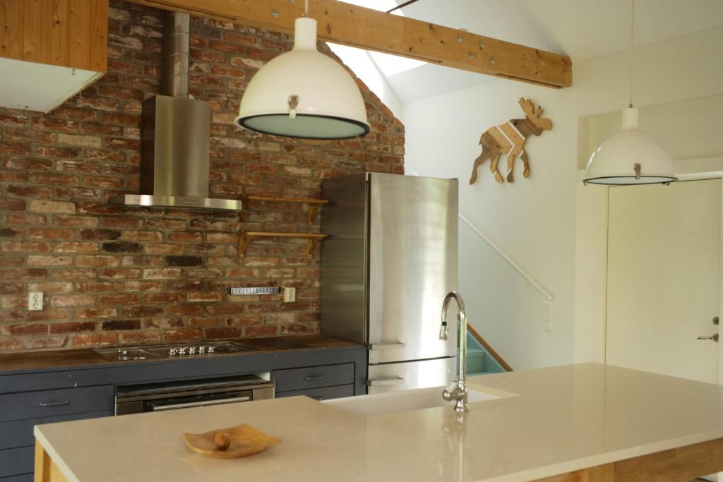 Kuchyň nebo kuchyňský kout v ubytování Gransäng Loft House