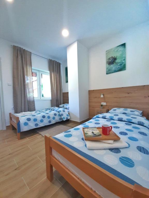 Postel nebo postele na pokoji v ubytování Pool and Villa Splav Dunavac
