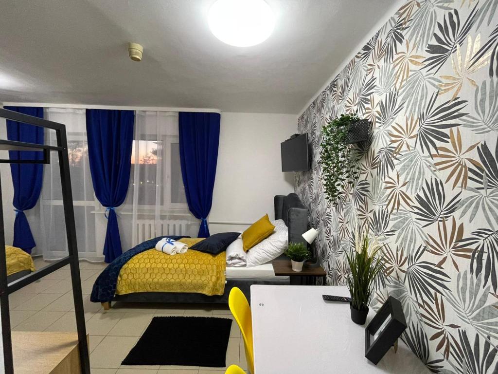 Postel nebo postele na pokoji v ubytování Great Polonia Sand Beach Mielno