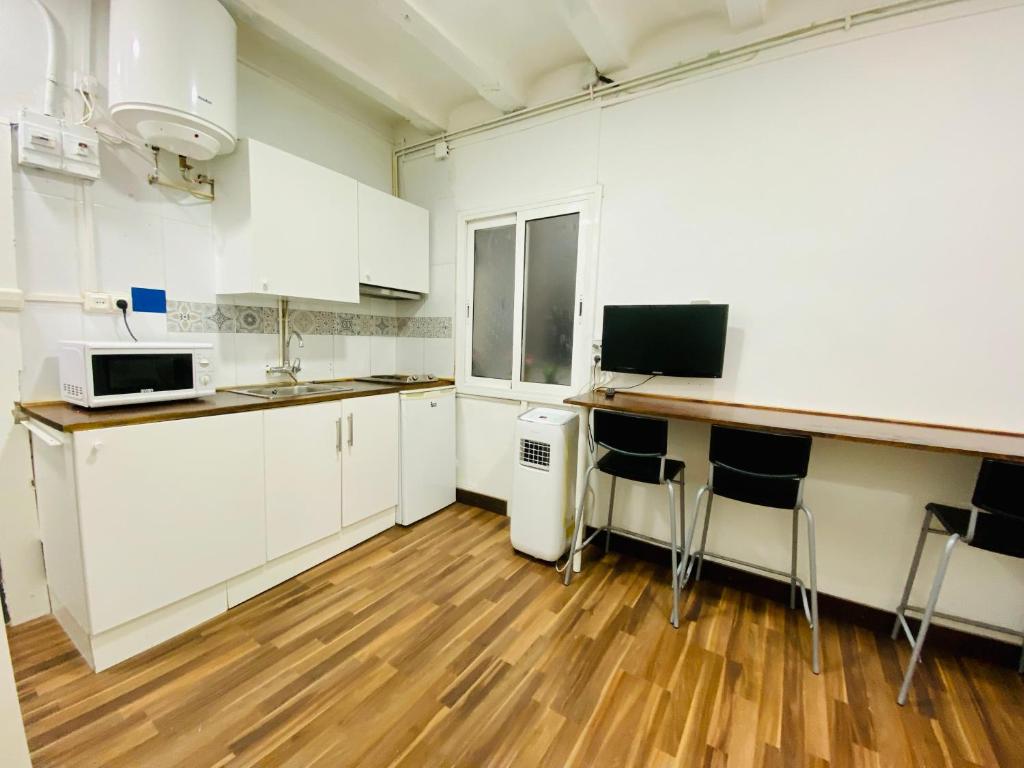 Kuchyňa alebo kuchynka v ubytovaní 08 Apartament lof 3 2
