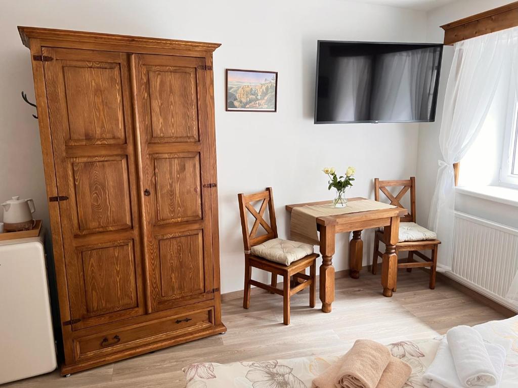 Posezení v ubytování PENSION POD SKALOU