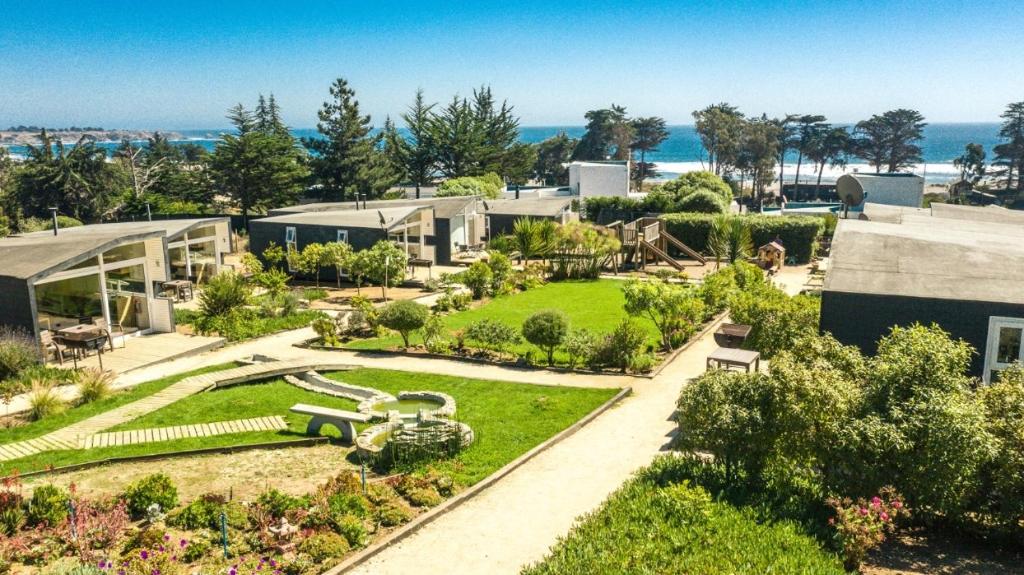 an aerial view of a garden in a building at Curi Lodge Pichilemu in Pichilemu