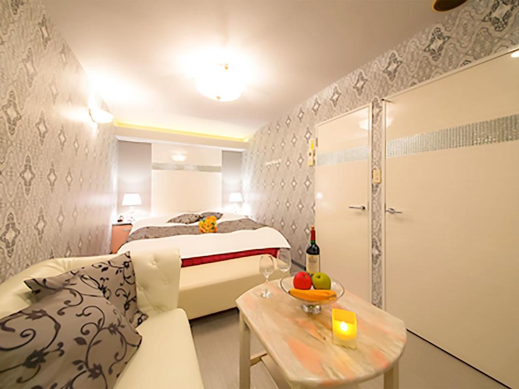 Postel nebo postele na pokoji v ubytování Hotel GT Kansai International Airport (Adult Only)