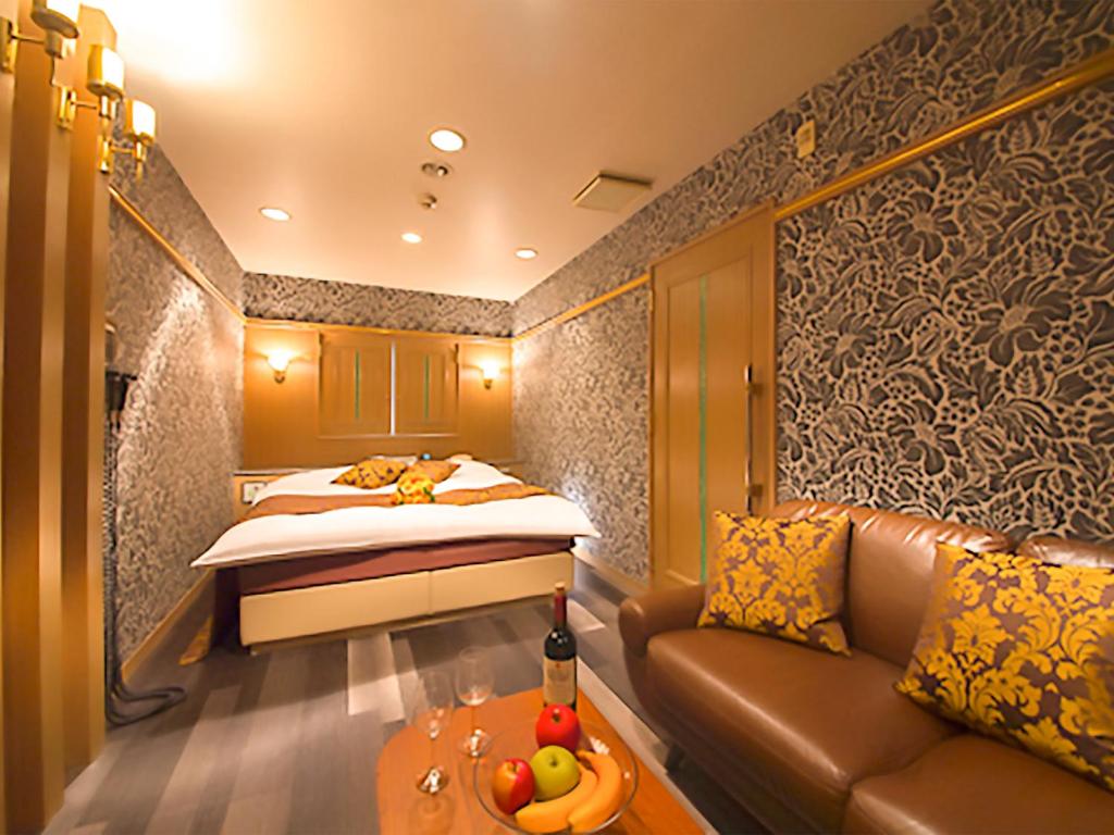 Postel nebo postele na pokoji v ubytování Hotel GT Kansai International Airport (Adult Only)