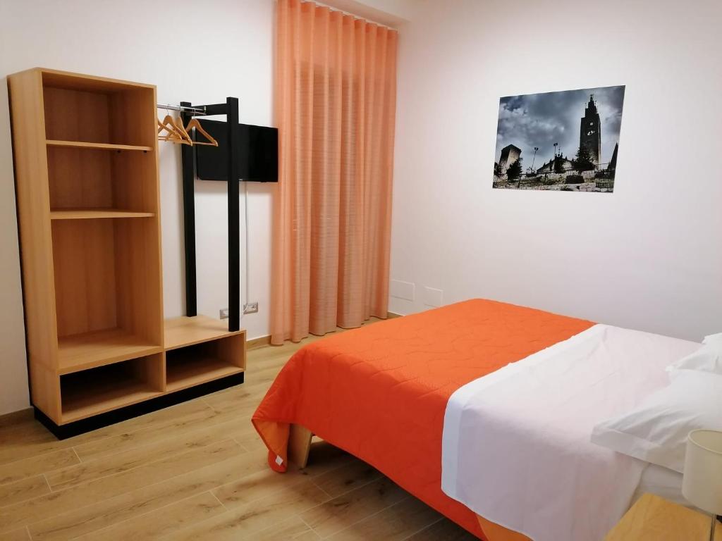 A bed or beds in a room at Nonna Elvira
