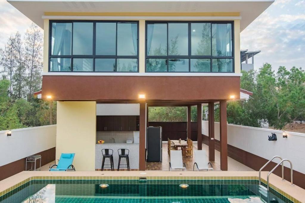 ลูน่า ปราณบุรี ปาร์ตี้ พลูวิลล่า เดินไปทะเล150เมตร Lunar Pranburi Party Pool Villa walk to beach 150Meter - Housity