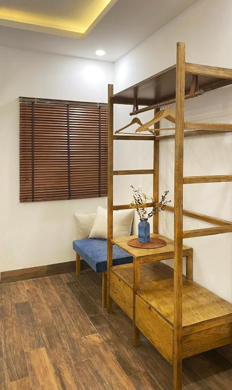 Postel nebo postele na pokoji v ubytování Lacovy Home Hội An