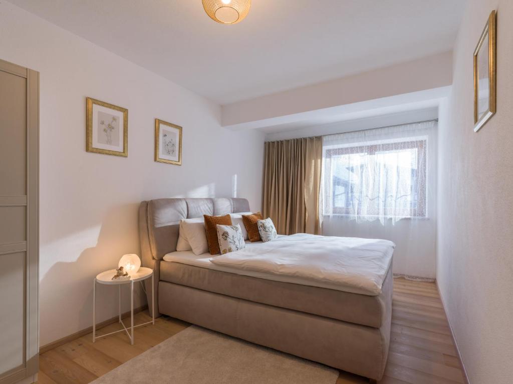 Postel nebo postele na pokoji v ubytování Haus TIROL