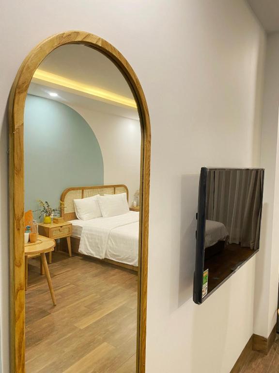 Postel nebo postele na pokoji v ubytování Lacovy Home Hội An