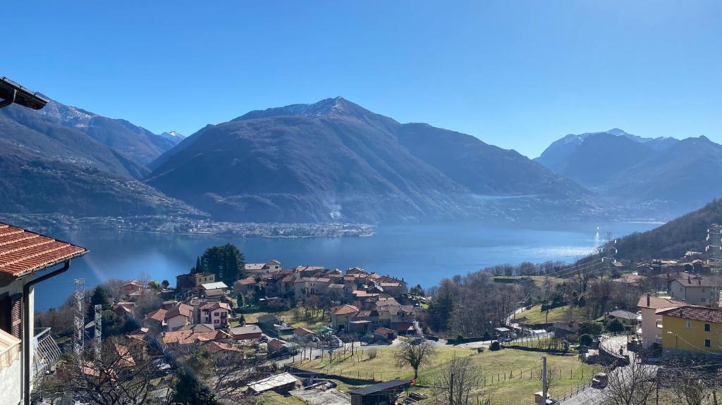 a view of a town with a lake and mountains at Holiday Home Delo - Cremia in Cremia